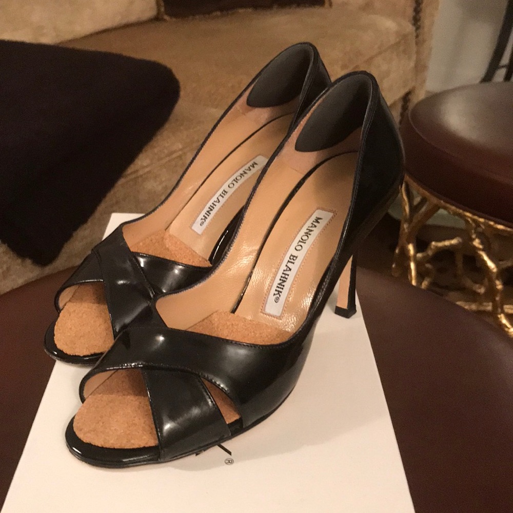 Manolo Blahnik black patent open toe pump.